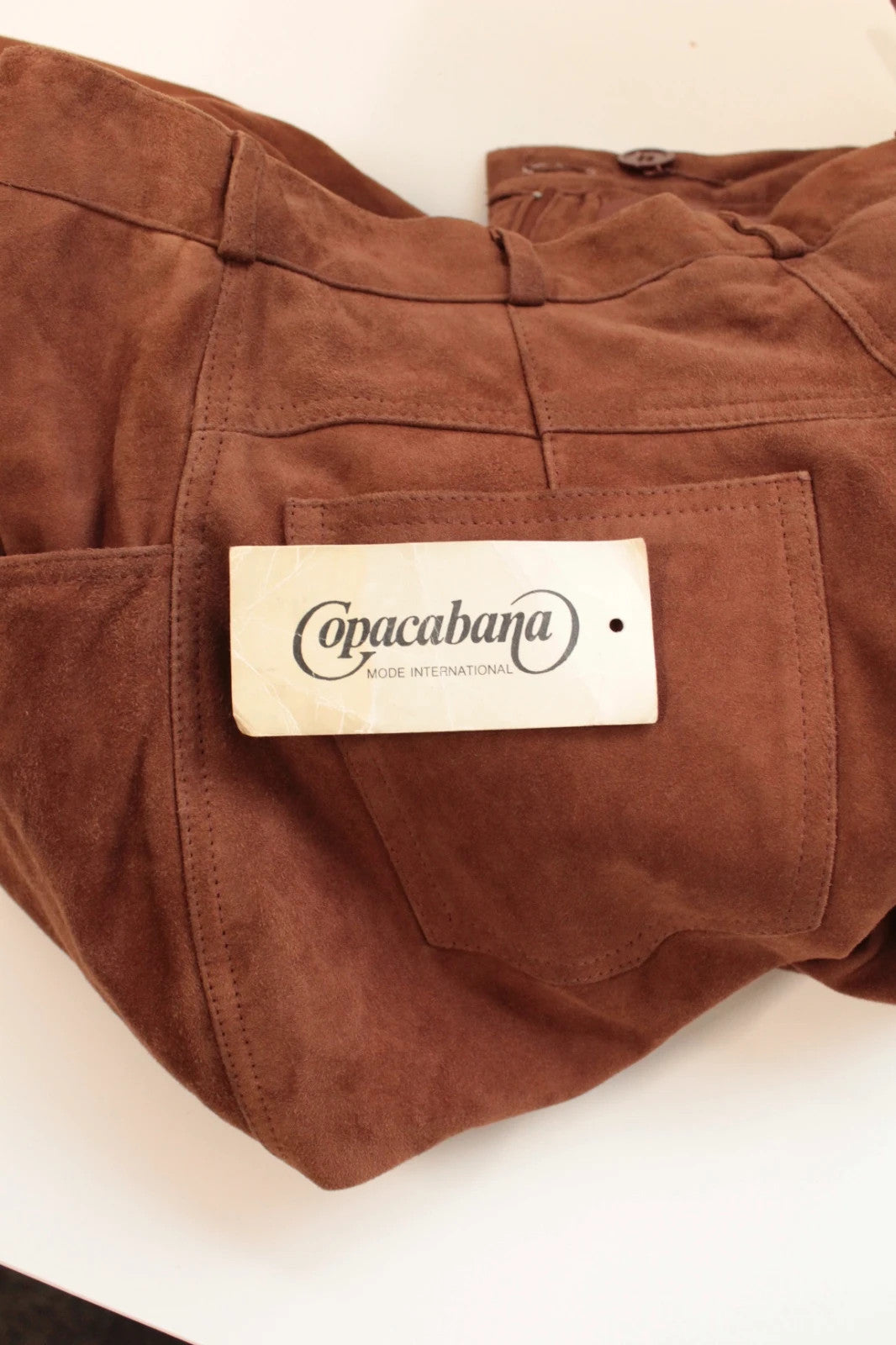 Copacabana brown suede trousers high-waisted tapered with five-pocket details and smooth lining.