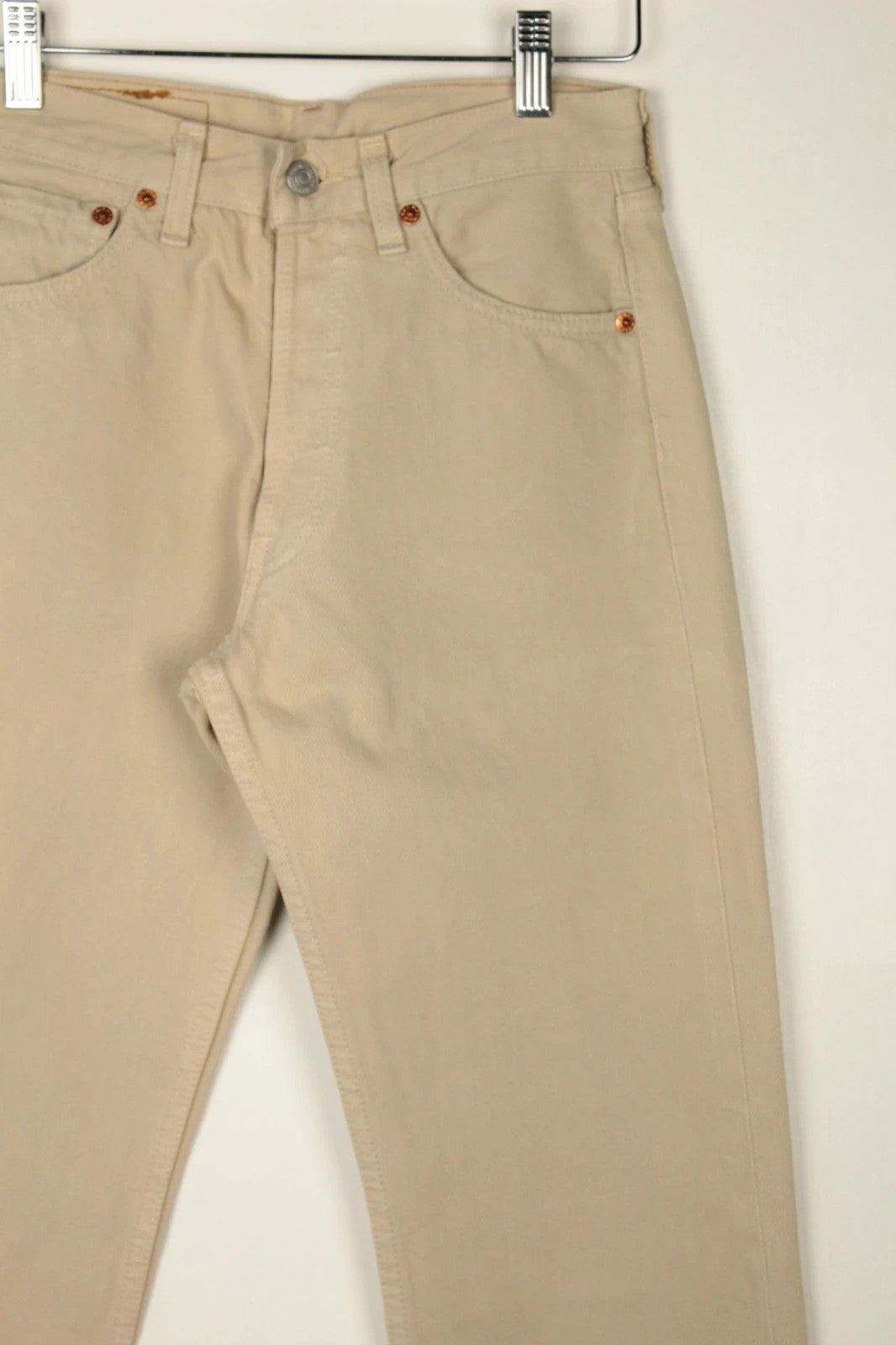Levi's beige straight jeans with button fly and vintage 501 label, made in France.