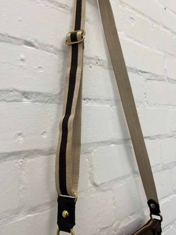 Coach brown monogram zip curved shoulder bag