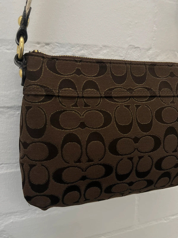 Coach brown monogram zip curved shoulder bag