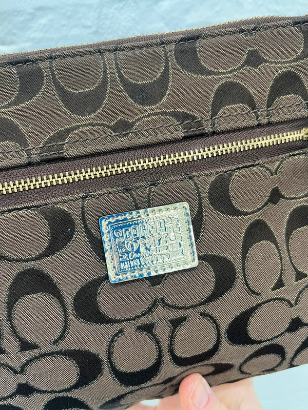 Coach brown monogram zip curved shoulder bag