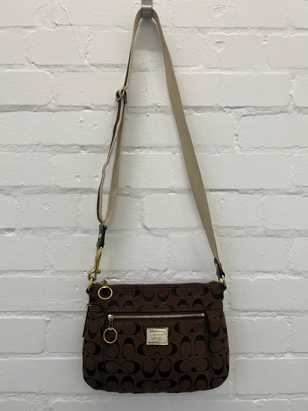 Coach brown monogram zip curved shoulder bag