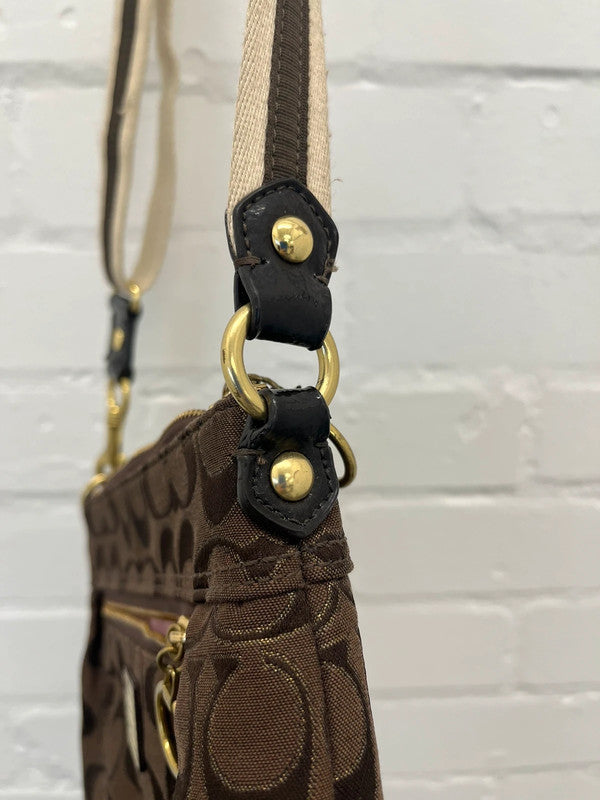 Coach brown monogram zip curved shoulder bag