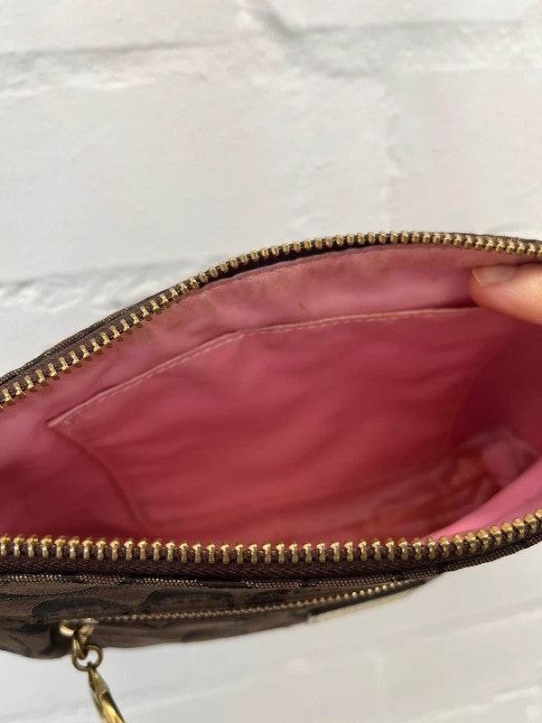 Coach brown monogram zip curved shoulder bag