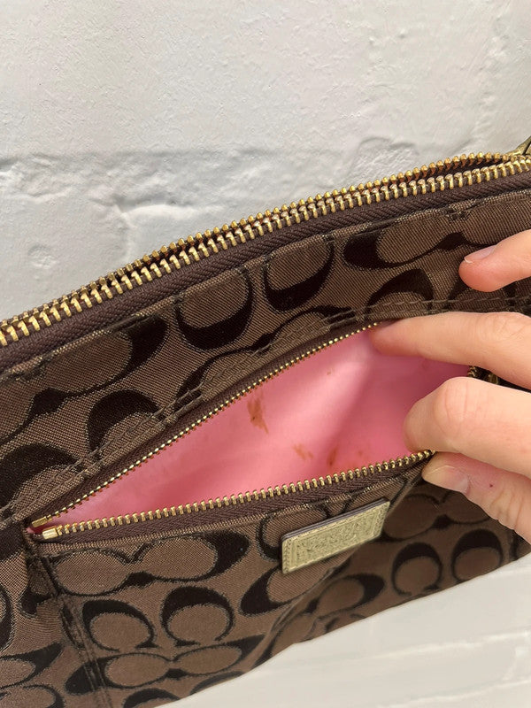 Coach brown monogram zip curved shoulder bag