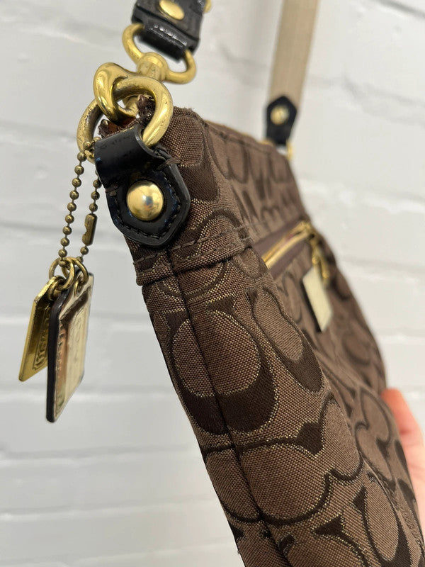 Coach brown monogram zip curved shoulder bag