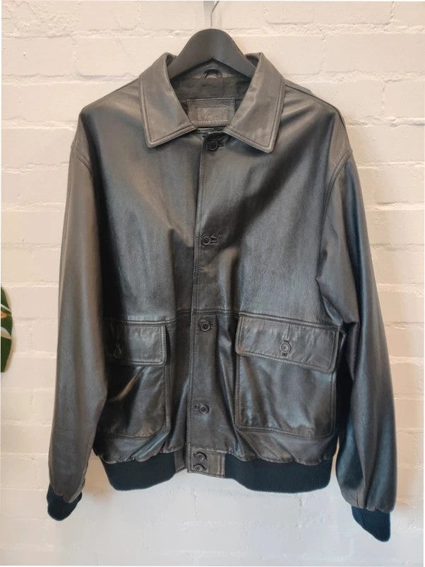 Premium black bomber jacket soft leather ribbed hem and cuffs aviator style.