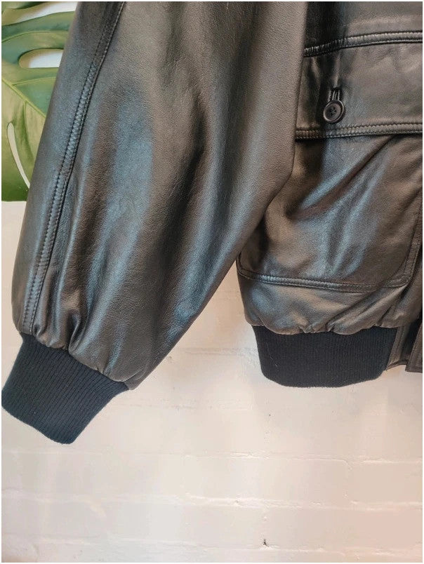 Premium black bomber jacket soft leather ribbed hem and cuffs aviator style.