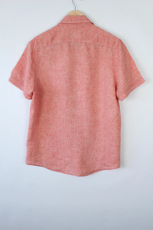 C&A salmon pink linen short sleeve shirt with subtle grain texture and chest pocket.