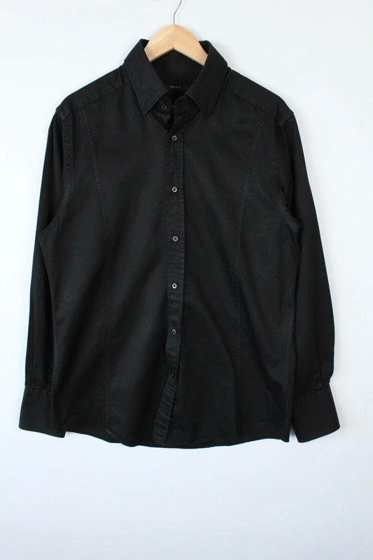 Gucci black long sleeve tailored shirt with precision-stitched panel darts and subtle sheen.