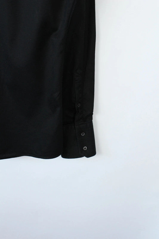 Gucci black long sleeve tailored shirt with precision-stitched panel darts and subtle sheen.