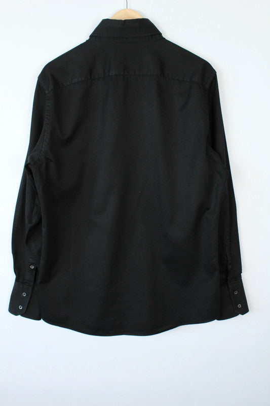 Gucci black long sleeve tailored shirt with precision-stitched panel darts and subtle sheen.