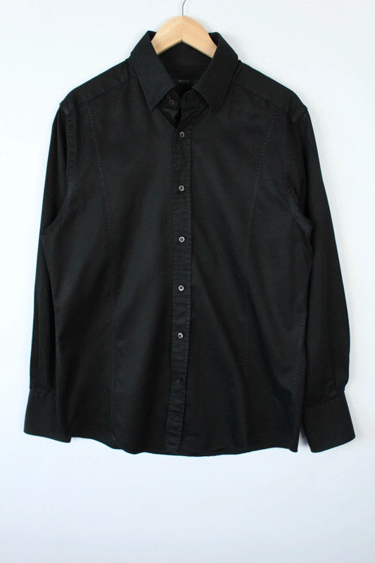 Gucci black long sleeve tailored shirt with precision-stitched panel darts and subtle sheen.