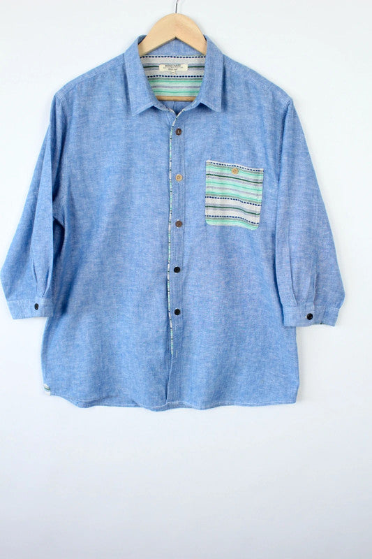 M2SQUARED blue linen tunic blouse with contrast striped pocket and 3/4 sleeves.