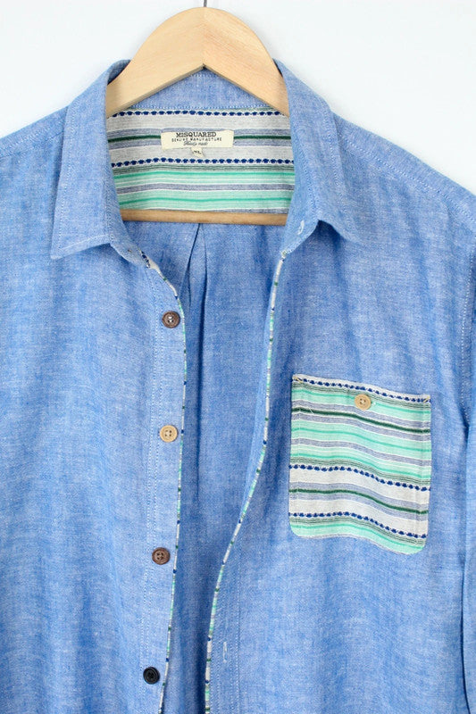 M2SQUARED blue linen tunic blouse with contrast striped pocket and 3/4 sleeves.