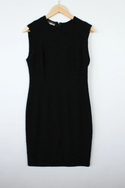 Salvatore Ferragamo black wool blend shift dress with subtle textured weave and sleeveless design.