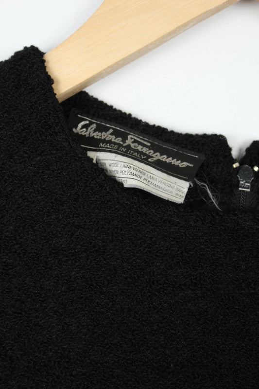 Salvatore Ferragamo black wool blend shift dress with subtle textured weave and sleeveless design.