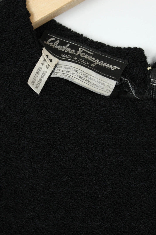 Salvatore Ferragamo black wool blend shift dress with subtle textured weave and sleeveless design.