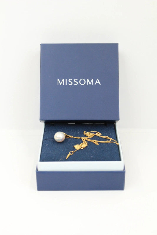 Missoma gold vermeil necklace with white freshwater pearl pendant and dainty satellite chain.
