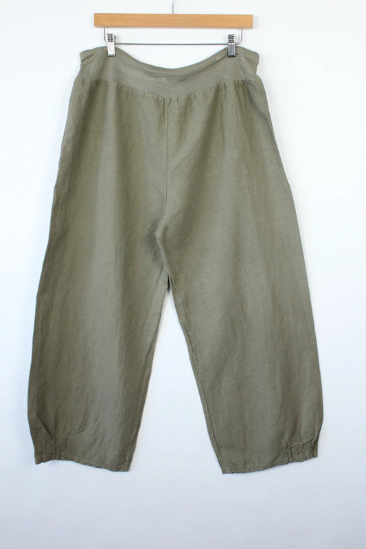 Vintage Dressing khaki linen balloon trousers with textured slub weave and relaxed fit.