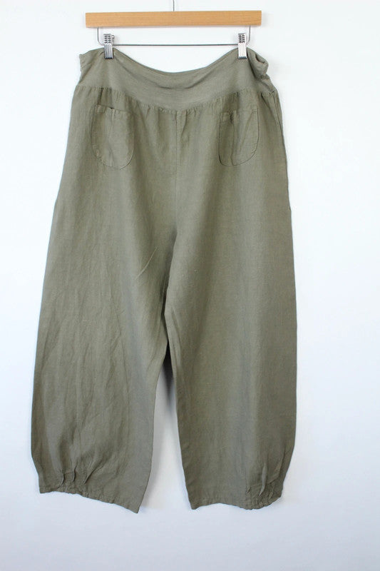 Vintage Dressing khaki linen balloon trousers with textured slub weave and relaxed fit.