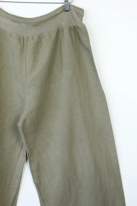Vintage Dressing khaki linen balloon trousers with textured slub weave and relaxed fit.