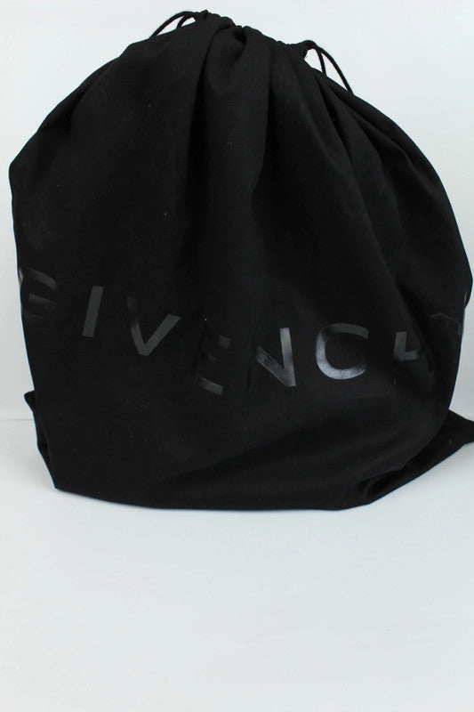 Givenchy black mini handbag with pentagonal logo patch and silver-tone hardware.