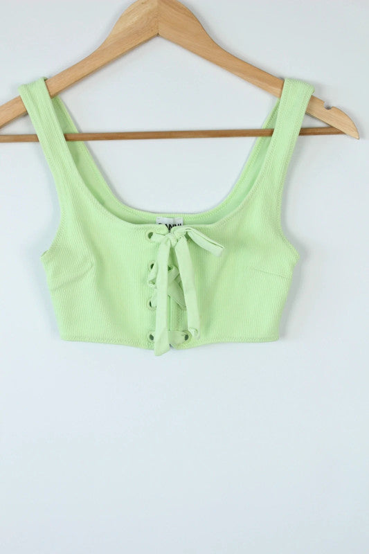 Ganni green ribbed lace-up corset bralette with square neckline and adjustable ties.