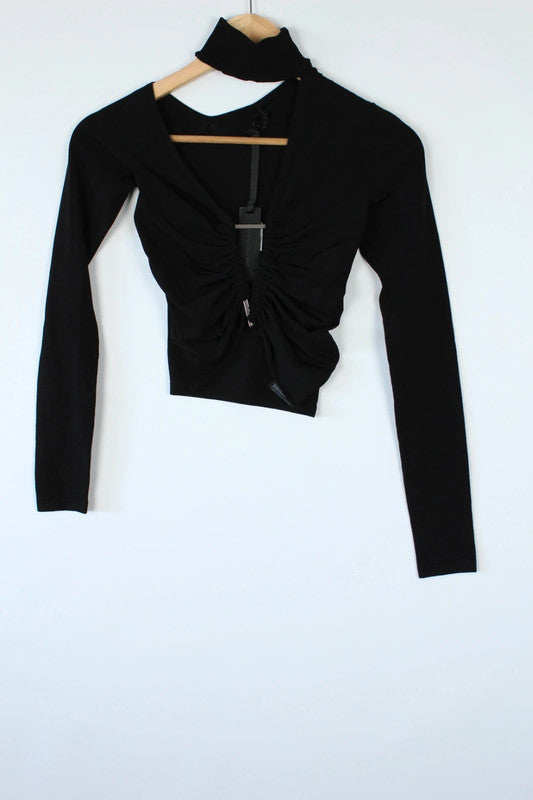 Ben Taverniti Unravel Project black asymmetric cut-out turtleneck vest in soft stretch knit.