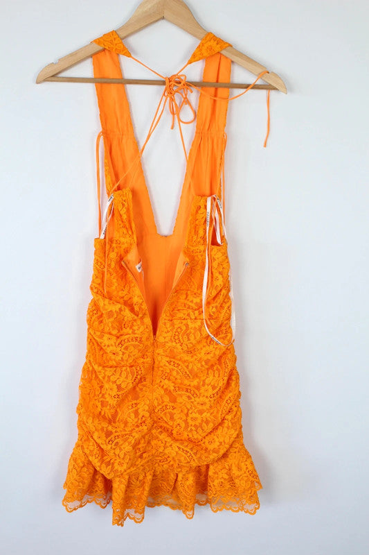 For Love & Lemons orange lace mini dress with floral pattern and plunge V-neckline.