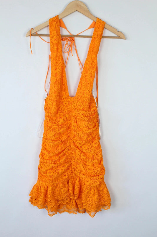 For Love & Lemons orange lace mini dress with floral pattern and plunge V-neckline.