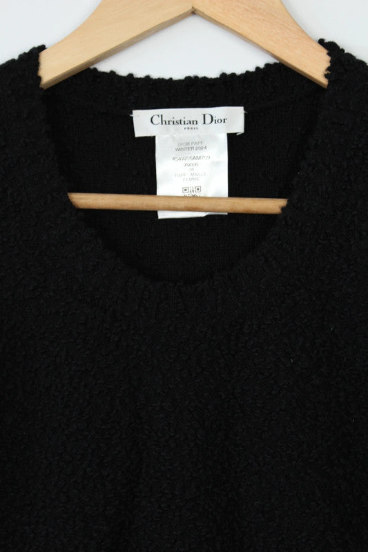 Christian Dior black sleeveless vest top with bouclé texture and scoop neck design.