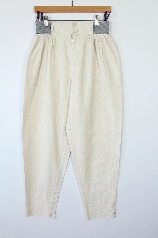 Yessica cream high-waisted linen trousers with elasticated pinstripe and front pleating details.