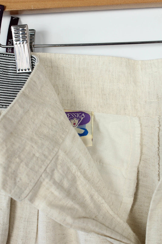 Yessica cream high-waisted linen trousers with elasticated pinstripe and front pleating details.