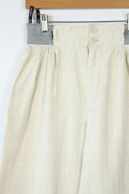 Yessica cream high-waisted linen trousers with elasticated pinstripe and front pleating details.