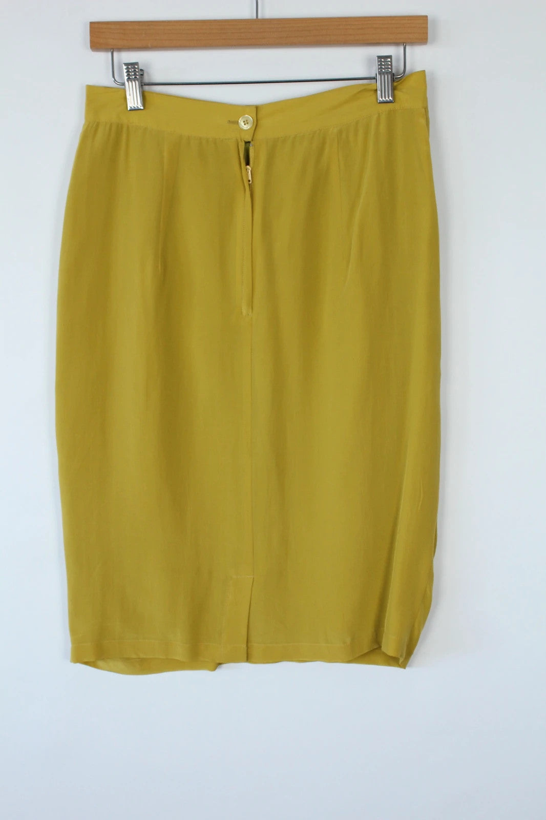 Vintage Dressing yellow silk pleated tulip skirt with drape details and side pockets.