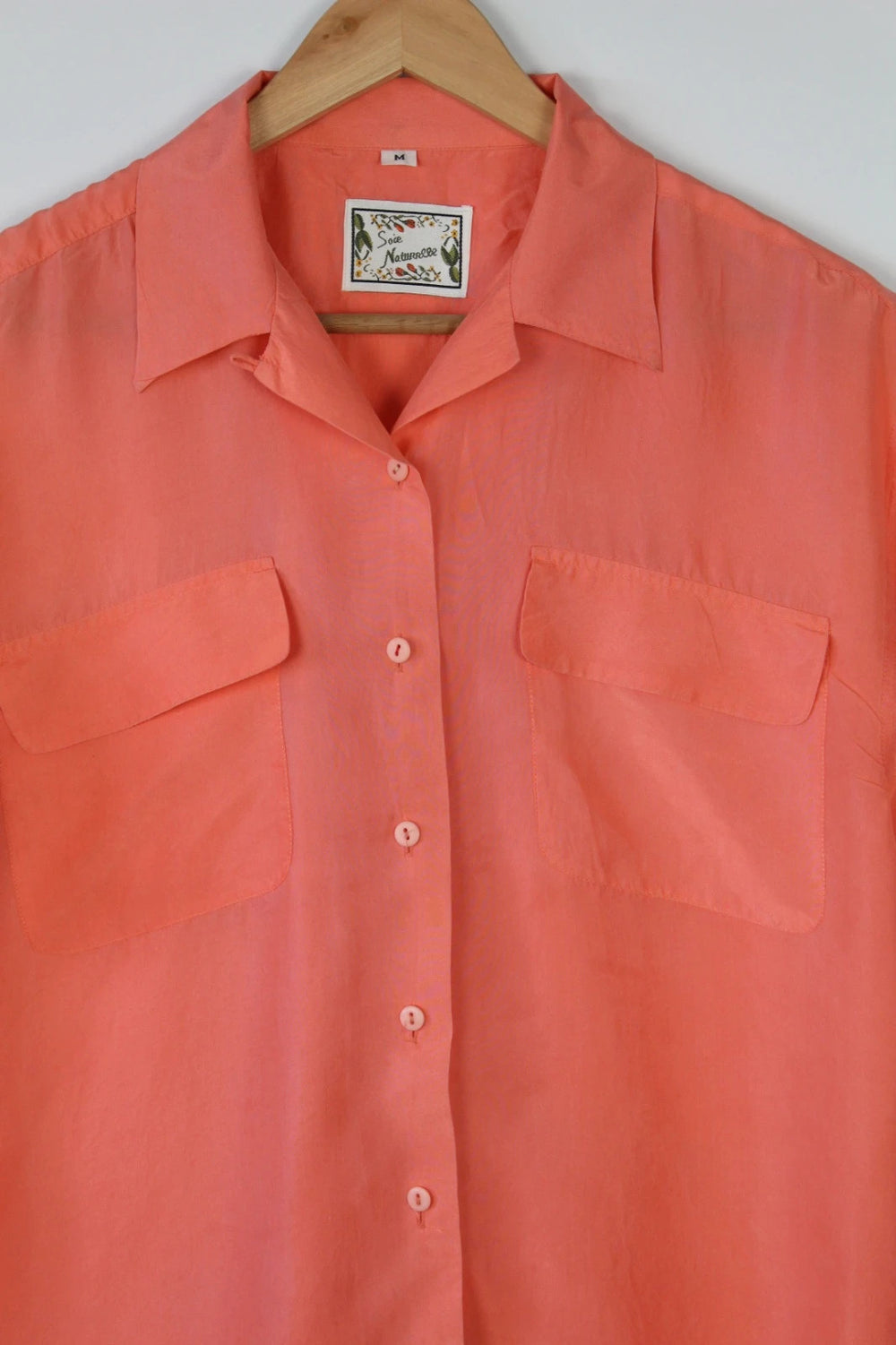 Vintage Dressing orange silk short sleeve blouse with utility camp collar and flap pockets.
