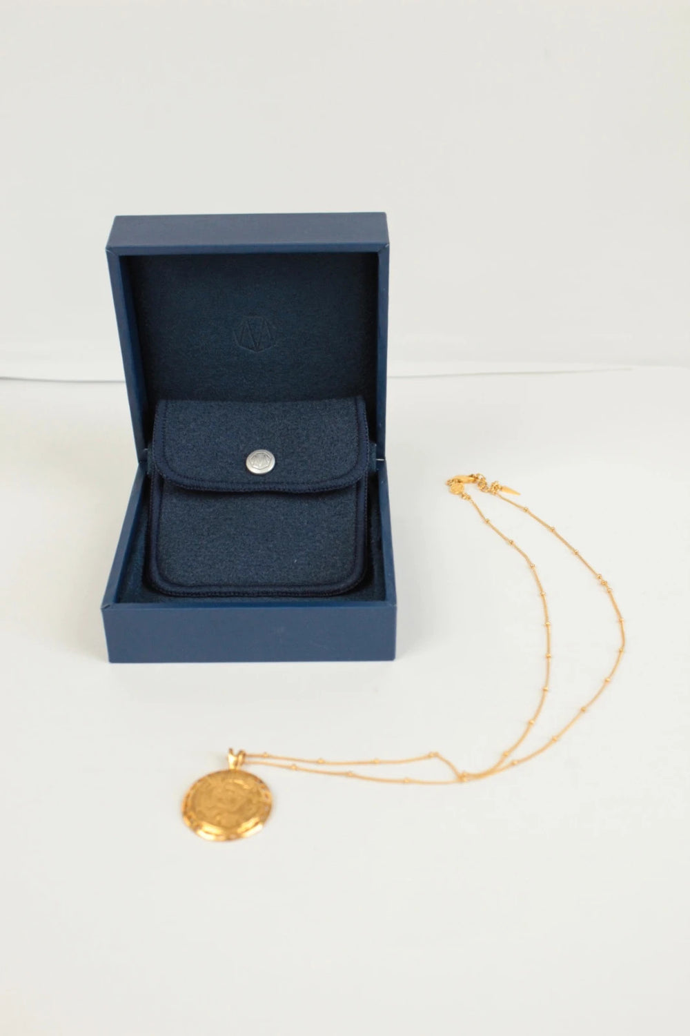Missoma gold necklace with Roman coin medallion pendant, 18ct gold vermeil on sterling silver.