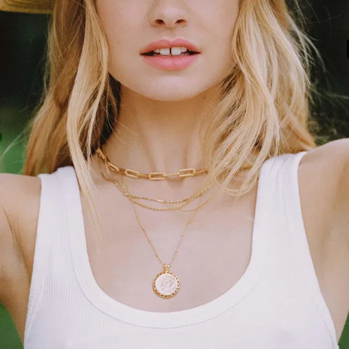 Missoma gold necklace with Roman coin medallion pendant, 18ct gold vermeil on sterling silver.