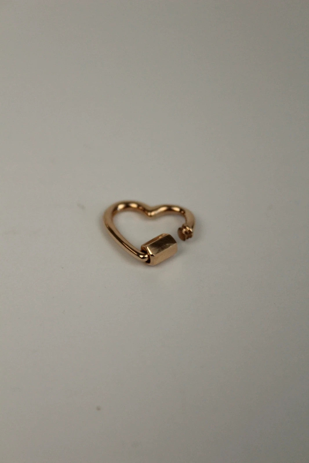 Maria Black gold heart carabiner charm in 22kt gold plated sterling silver.