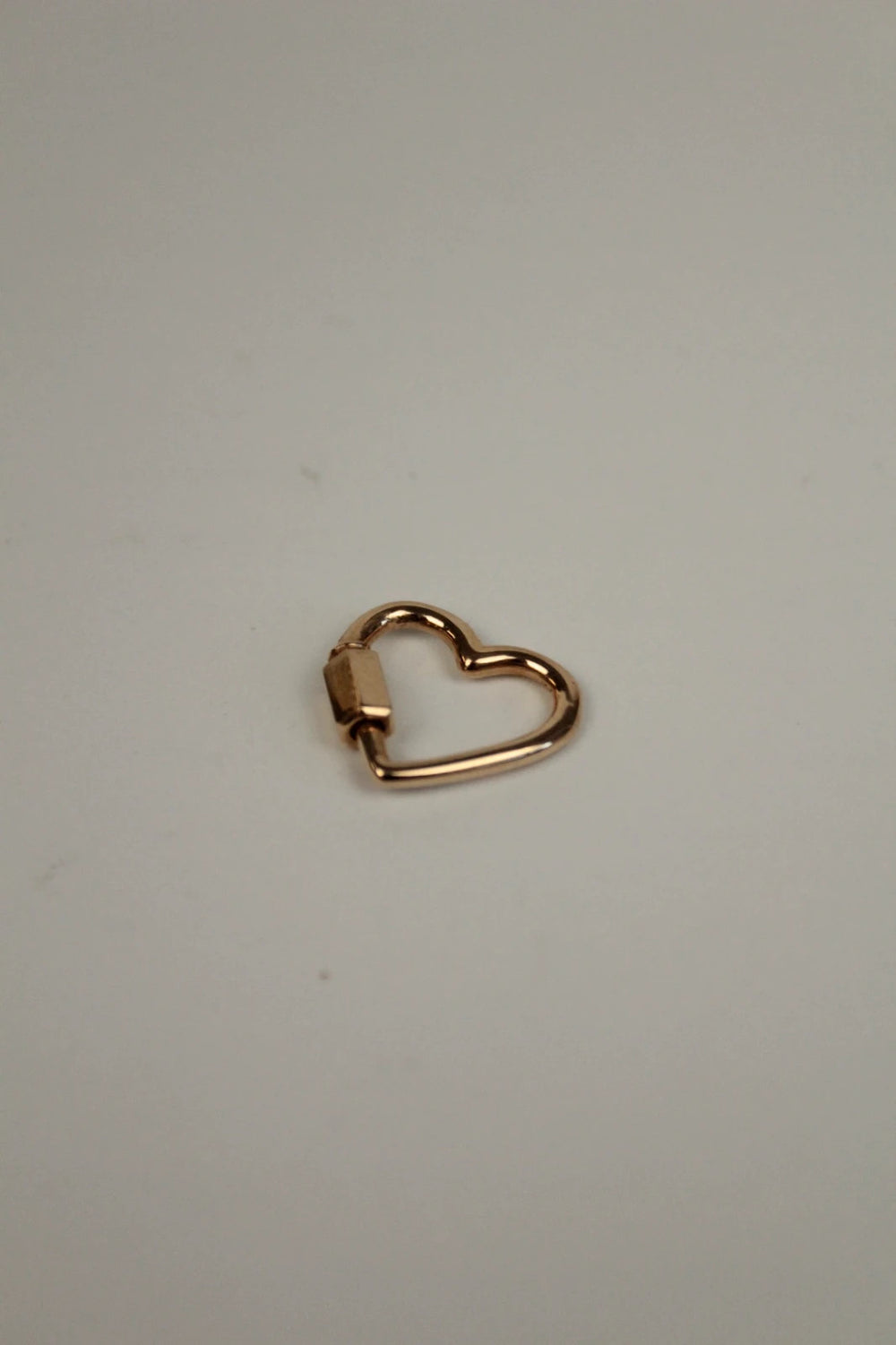 Maria Black gold heart carabiner charm in 22kt gold plated sterling silver.