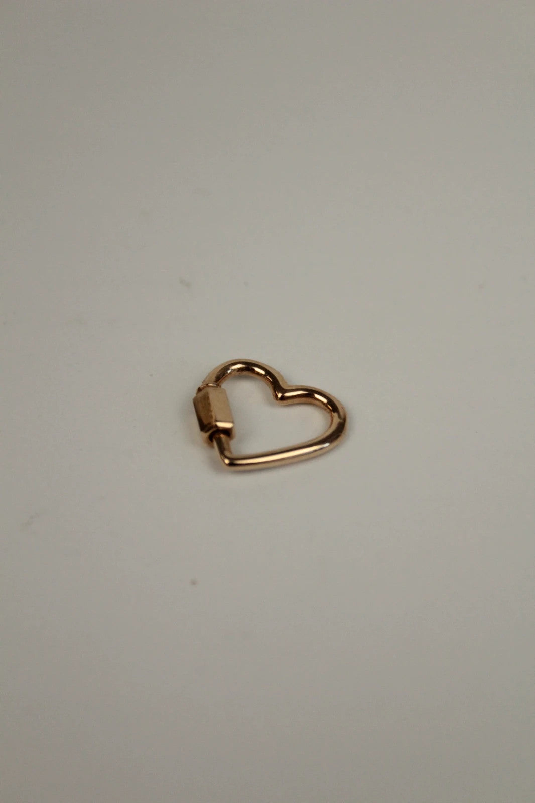 Maria Black gold heart carabiner charm in 22kt gold plated sterling silver.