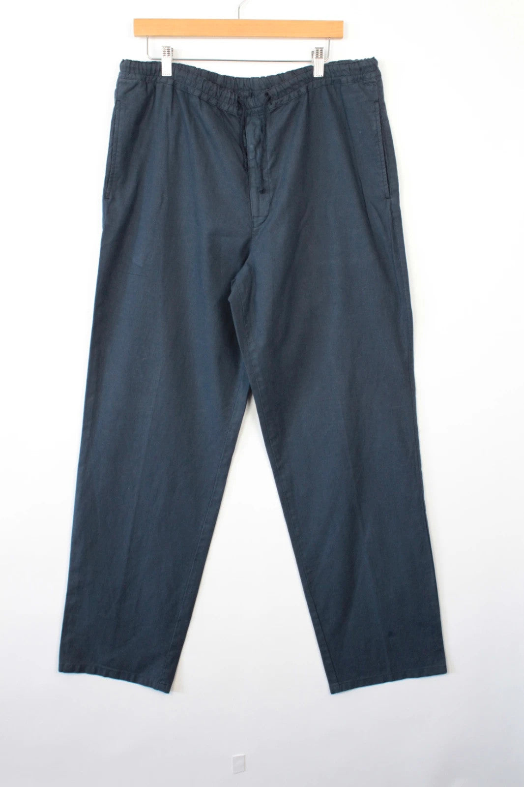 Barneys New York navy blue wide-leg trousers, drawstring waist, cotton linen blend fabric.