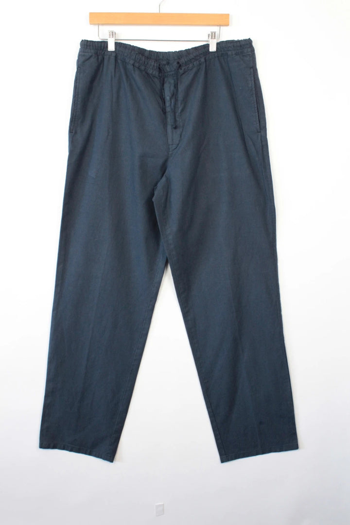 Barneys New York navy blue wide-leg trousers, drawstring waist, cotton linen blend fabric.