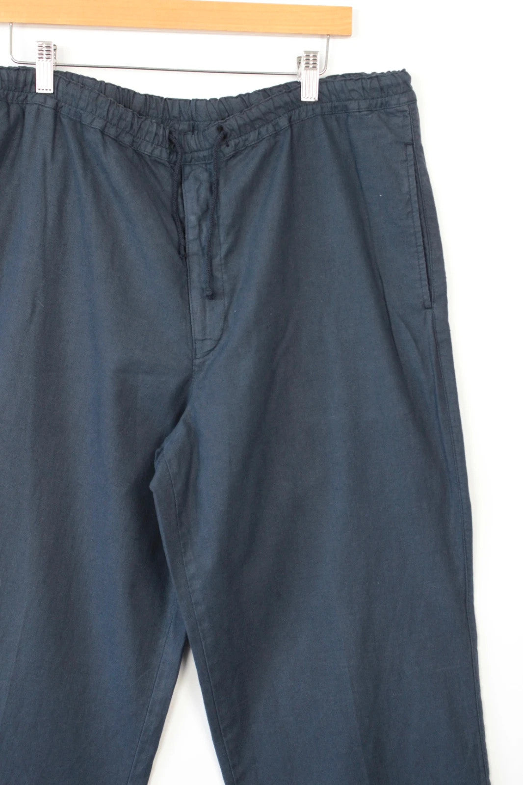 Barneys New York navy blue wide-leg trousers, drawstring waist, cotton linen blend fabric.