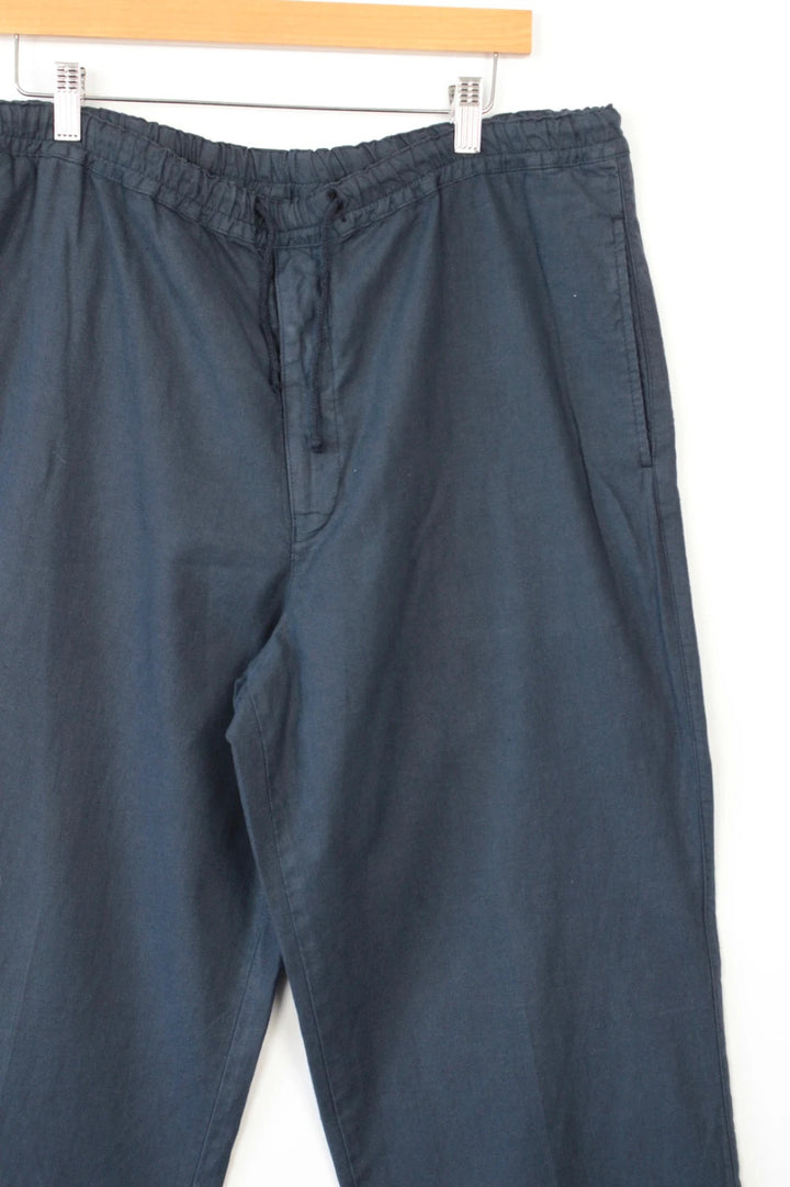 Barneys New York navy blue wide-leg trousers, drawstring waist, cotton linen blend fabric.