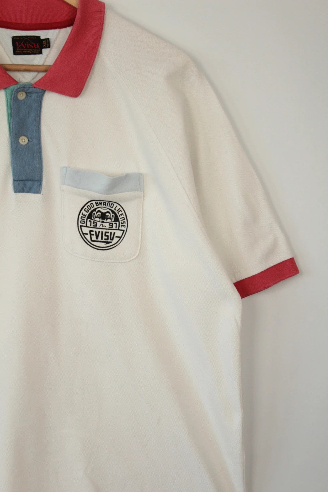 Evisu vintage men's polo shirt red and white colour-block design, premium cotton fabric.