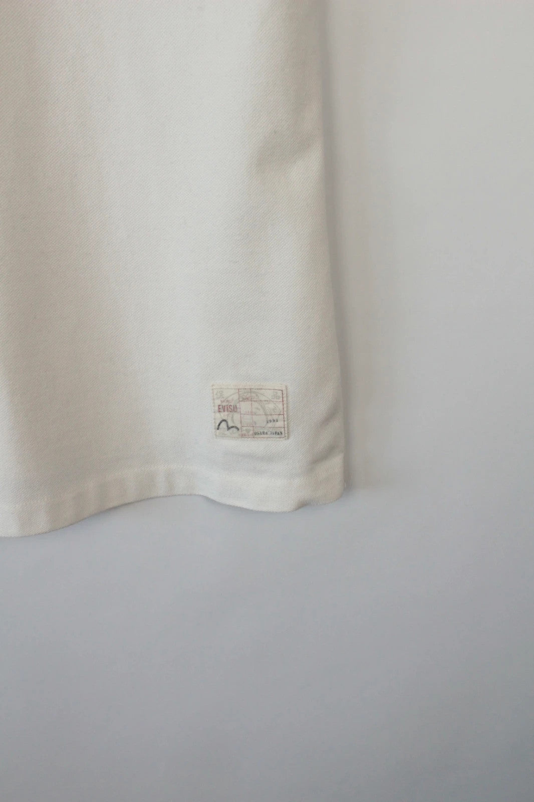 Evisu vintage men's polo shirt red and white colour-block design, premium cotton fabric.