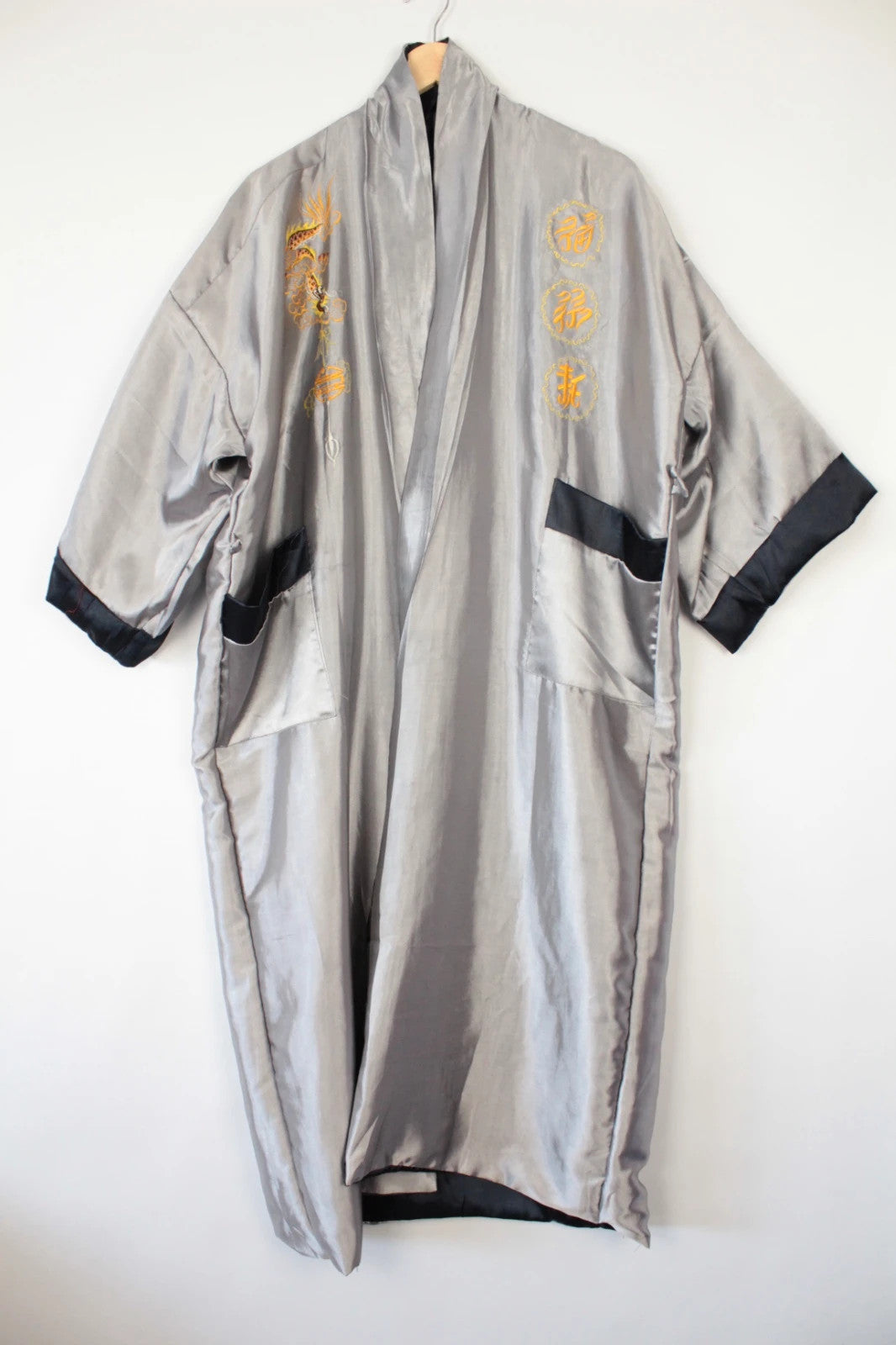 Japan Style reversible kimono robe black satin with gold dragon embroidery and kanji symbols.