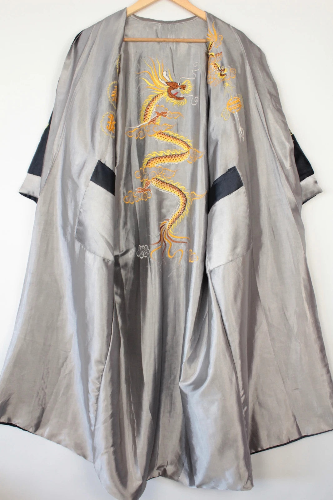 Japan Style reversible kimono robe black satin with gold dragon embroidery and kanji symbols.